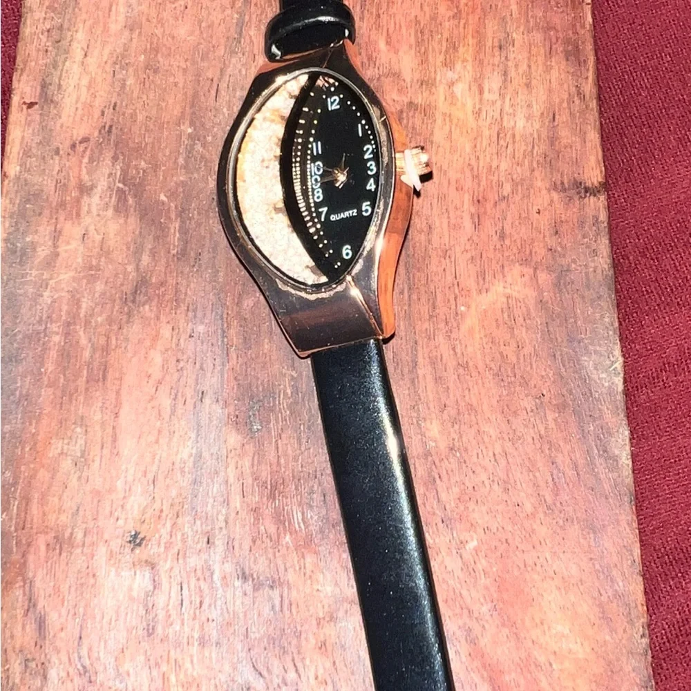 fashion watch with cz floating inside watch face ,‎ very beautiful